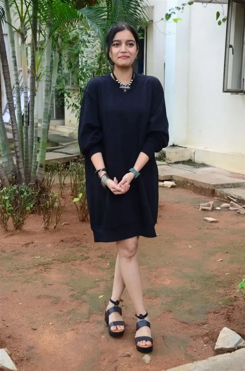 Actress Colors Swathi in Black Dress at Month Of Madhu Movie Press Meet